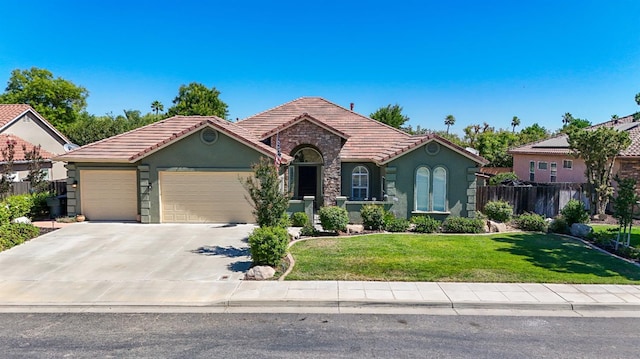 17024 Granite Falls Way, Chowchilla, CA 93610 - view of front facade with a garage, stucco siding, a tiled roof, and driveway