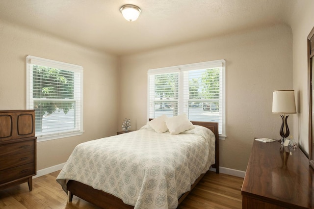 920 W 6th St, Madera, CA 93637 - bedroom with light wood-style floors