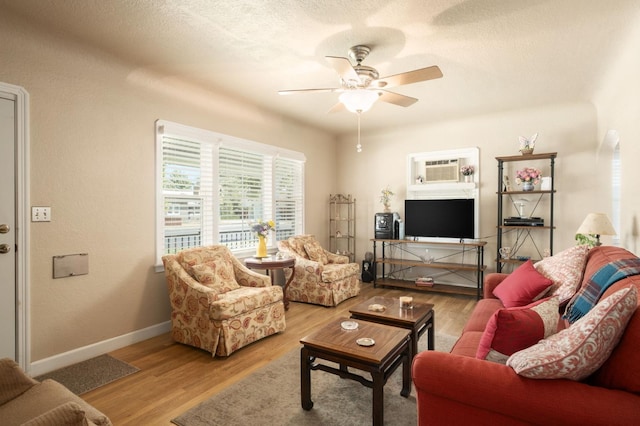 920 W 6th St, Madera, CA 93637 - living area with a ceiling fan, wood finished floors, and a textured ceiling