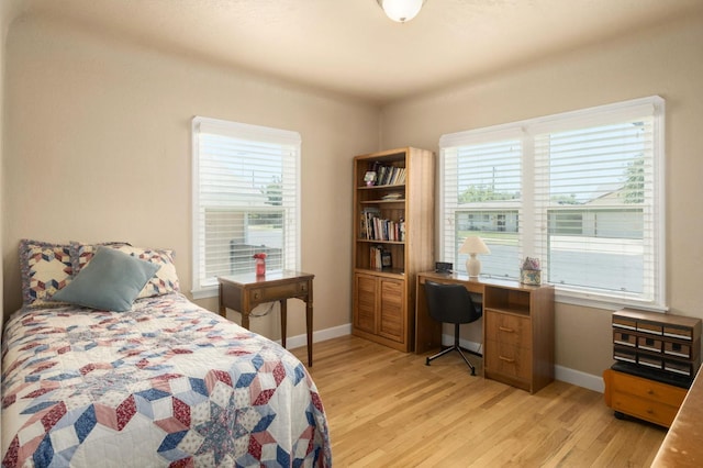 920 W 6th St, Madera, CA 93637 - bedroom with light wood finished floors and an office area