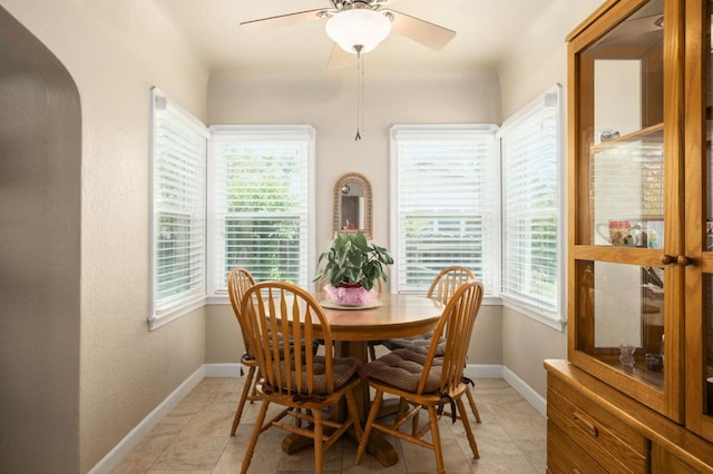 920 W 6th St, Madera, CA 93637 - dining room with ceiling fan and arched walkways