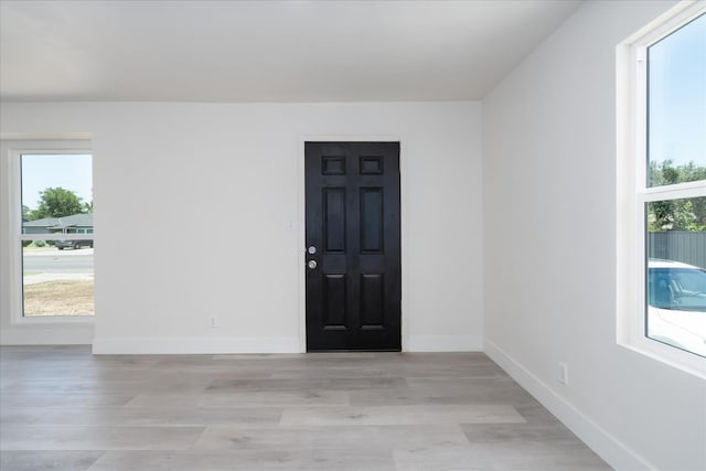 2012 E Clinton Ave, Fresno, CA 93703 - empty room with light wood-type flooring and baseboards