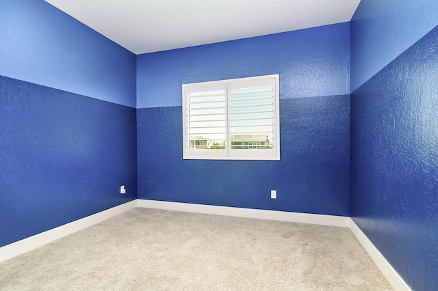 165 Timberline Way S, Madera, CA 93636 - spare room featuring carpet floors and a textured wall