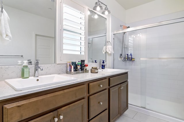 165 Timberline Way S, Madera, CA 93636 - bathroom with double vanity, a stall shower, and tile patterned flooring