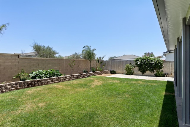 165 Timberline Way S, Madera, CA 93636 - fenced backyard with a patio area