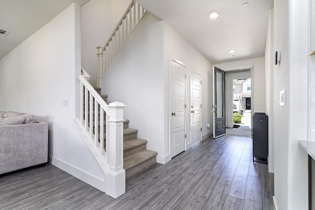 165 Timberline Way S, Madera, CA 93636 - entryway with wood finished floors, stairway, and recessed lighting
