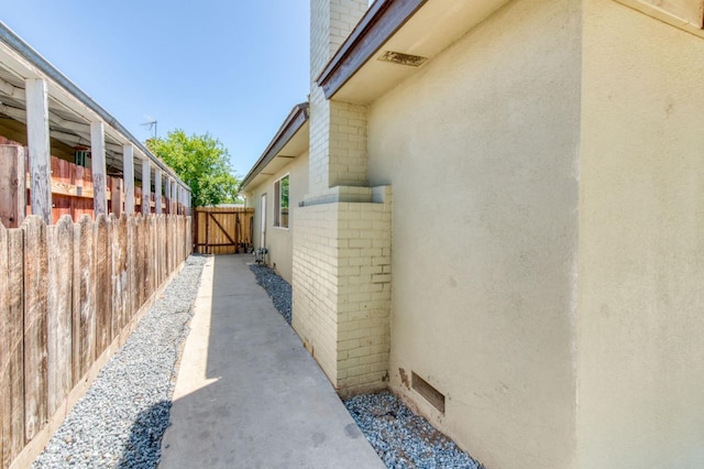 447 W Scott Ave, Clovis, CA 93612 - view of property exterior with brick siding and stucco siding