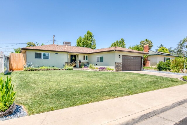 447 W Scott Ave, Clovis, CA 93612 - single story home featuring an attached garage, stucco siding, concrete driveway, and a chimney