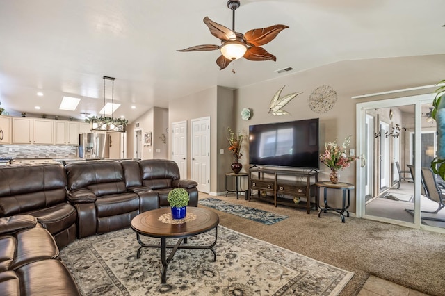 3624 N Jackie, Visalia, CA 93291 - living area featuring lofted ceiling, ceiling fan, recessed lighting, carpet floors, and a skylight