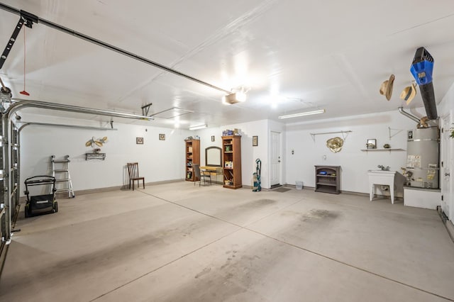 3624 N Jackie, Visalia, CA 93291 - garage featuring water heater and a garage door opener
