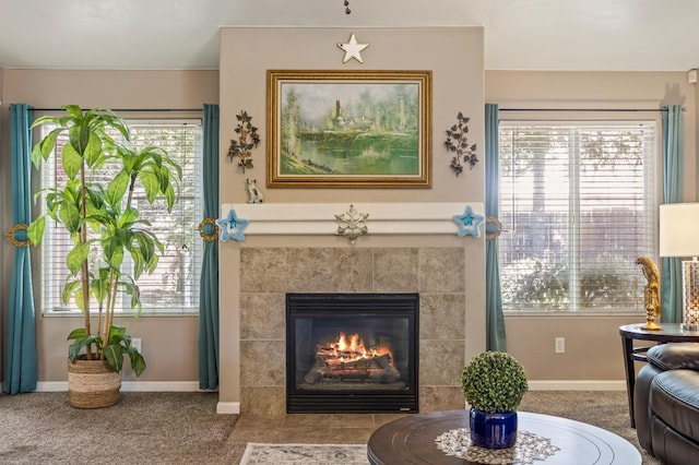 3624 N Jackie, Visalia, CA 93291 - living room featuring a tiled fireplace and plenty of natural light