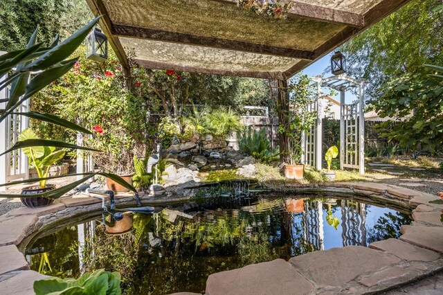 3624 N Jackie, Visalia, CA 93291 - view of swimming pool featuring a garden pond