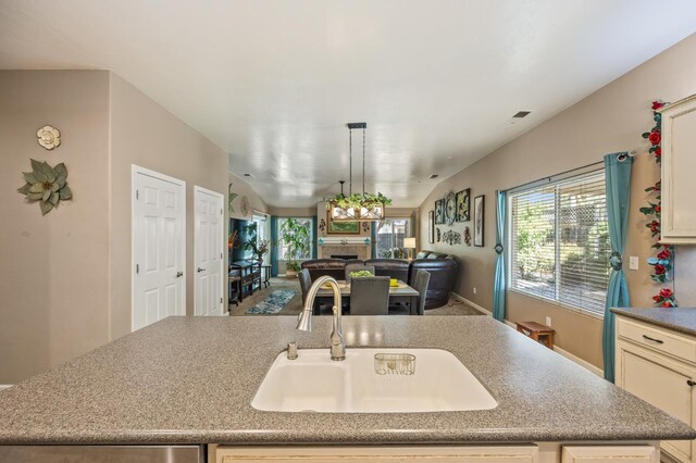 3624 N Jackie, Visalia, CA 93291 - kitchen featuring open floor plan, an island with sink, and decorative light fixtures