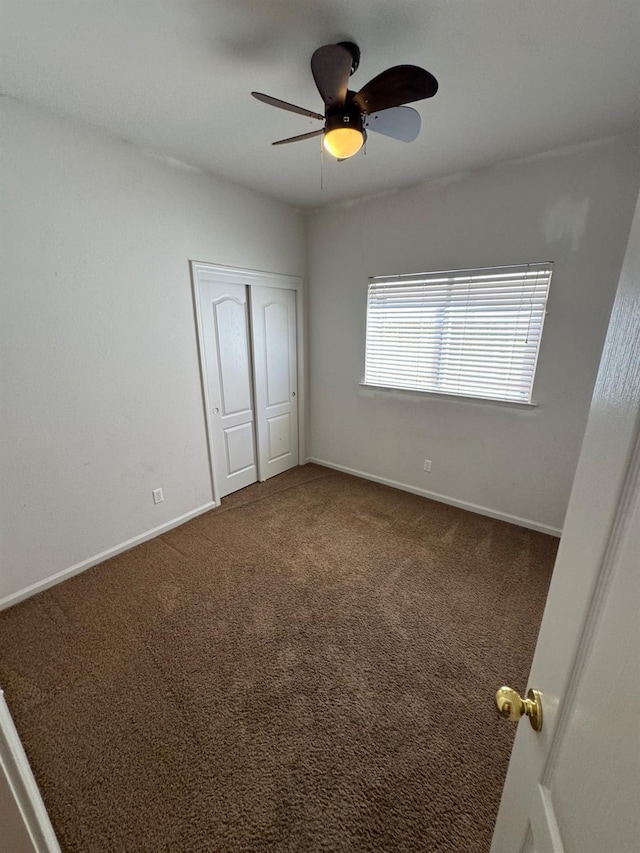 2428 E Emilie Ave, Fresno, CA 93730 - unfurnished bedroom featuring a closet, carpet flooring, and a ceiling fan
