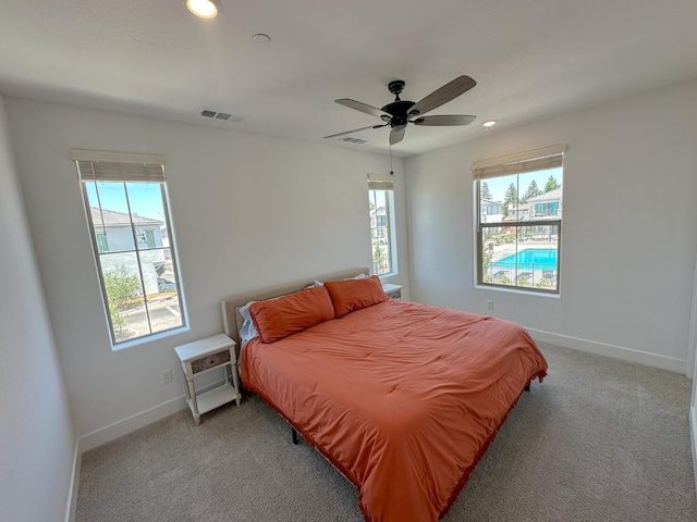 546 W Mahogany, Clovis, CA 93611 - bedroom with multiple windows, recessed lighting, light carpet, and a ceiling fan