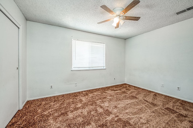 3340 N Dante Ave, Fresno, CA 93722 - spare room featuring carpet floors, ceiling fan, and a textured ceiling