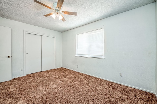 3340 N Dante Ave, Fresno, CA 93722 - unfurnished bedroom with carpet, a textured ceiling, a closet, and a ceiling fan