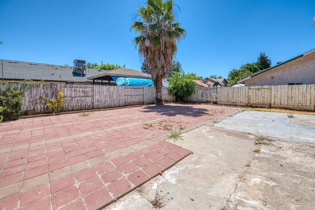 3340 N Dante Ave, Fresno, CA 93722 - fenced backyard with a patio area