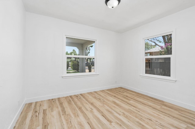 1022 N Carruth Ave, Fresno, CA 93728 - unfurnished room featuring wood finished floors and baseboards