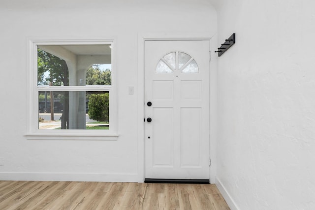 1022 N Carruth Ave, Fresno, CA 93728 - foyer entrance with plenty of natural light and light wood-type flooring