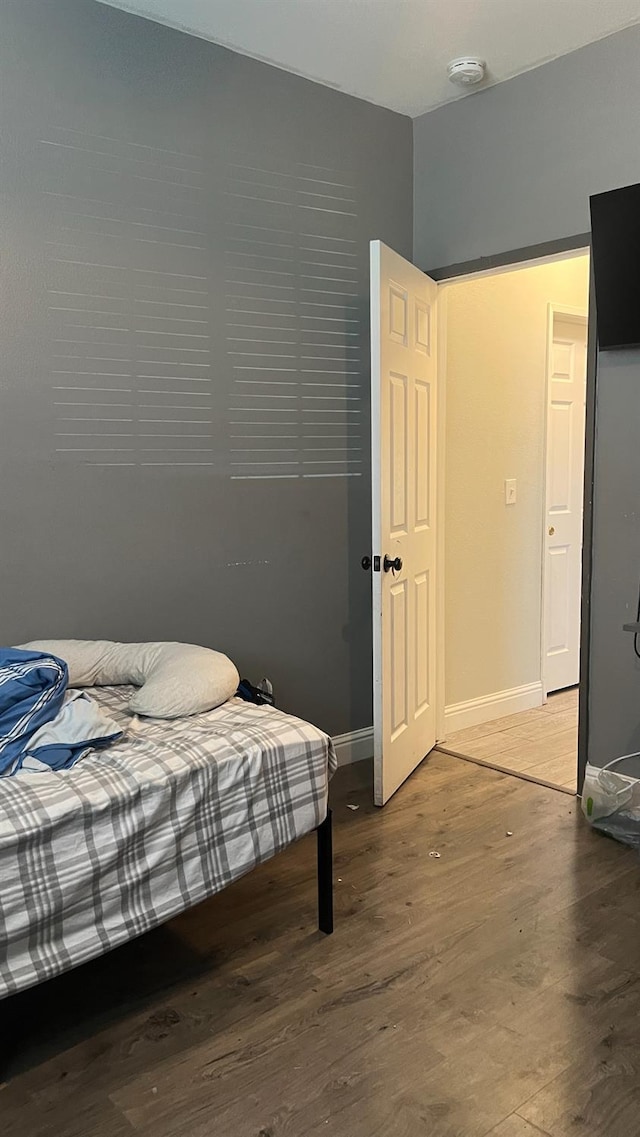 2434 Cherrywood Ct, Hanford, CA 93230 - bedroom featuring wood finished floors and baseboards