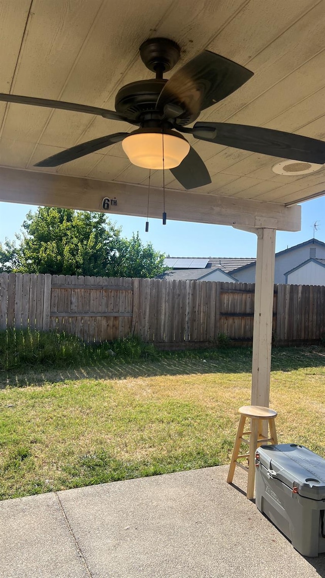 2434 Cherrywood Ct, Hanford, CA 93230 - fenced backyard with a patio and ceiling fan