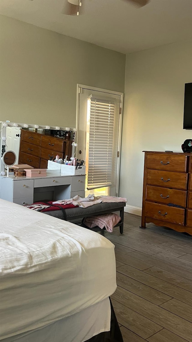 2434 Cherrywood Ct, Hanford, CA 93230 - bedroom featuring dark wood-style floors and baseboards