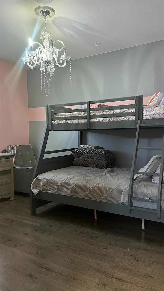 2434 Cherrywood Ct, Hanford, CA 93230 - bedroom featuring wood finished floors and a chandelier