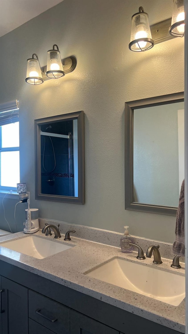 2434 Cherrywood Ct, Hanford, CA 93230 - full bathroom featuring double vanity