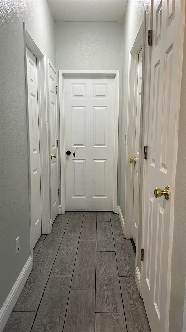 2434 Cherrywood Ct, Hanford, CA 93230 - corridor with wood finished floors