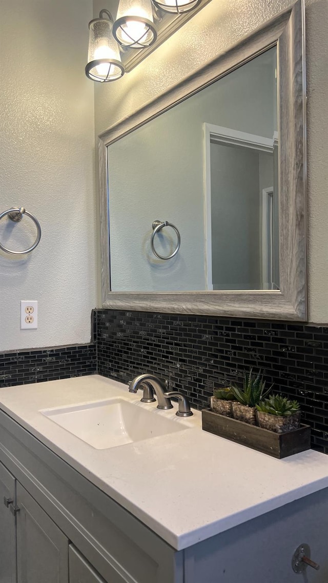 2434 Cherrywood Ct, Hanford, CA 93230 - bathroom with tasteful backsplash and vanity