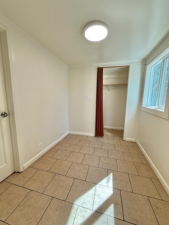 2824 C St, Selma, CA 93662 - spare room with light tile patterned flooring and baseboards