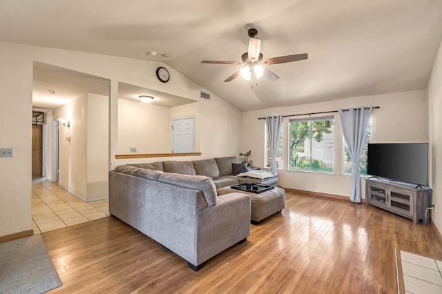 2687 Fowler Ave, Clovis, CA 93611 - living room with ceiling fan, light wood-style floors, and vaulted ceiling