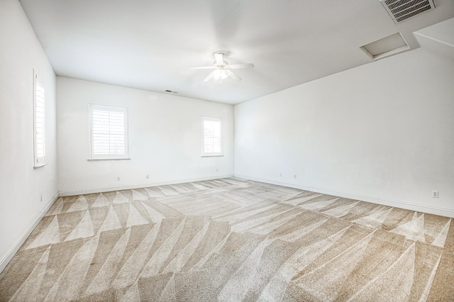 2593 E Utah, Fresno, CA 93720 - unfurnished room featuring a ceiling fan, light carpet, and attic access