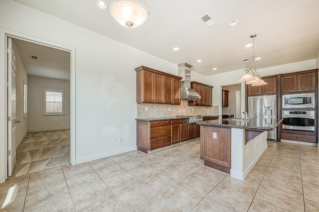 2593 E Utah, Fresno, CA 93720 - kitchen with stainless steel appliances, wall chimney exhaust hood, decorative backsplash, light tile patterned floors, and dark stone countertops