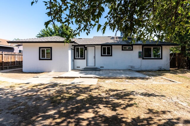 1934 W Pontiac Way, Fresno, CA 93705 - view of front of house featuring a patio area, stucco siding, and roof with shingles