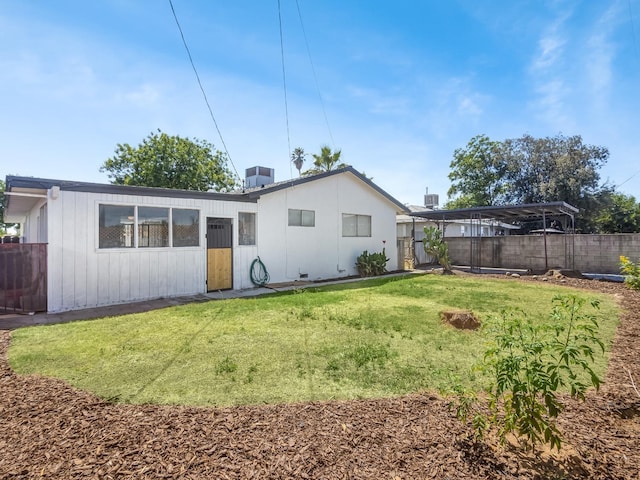 4326 N Holt, Fresno, CA 93705 - back of house featuring a fenced backyard and board and batten siding