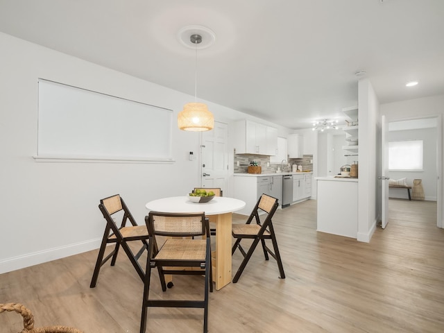 4326 N Holt, Fresno, CA 93705 - dining room featuring light wood-style floors and baseboards