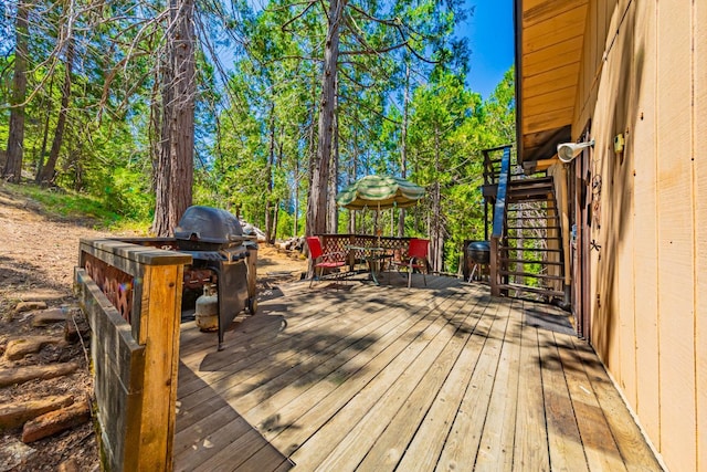 53608 Chipo Poyah, North Fork, CA 93643 - deck with stairs, outdoor dining space, and grilling area
