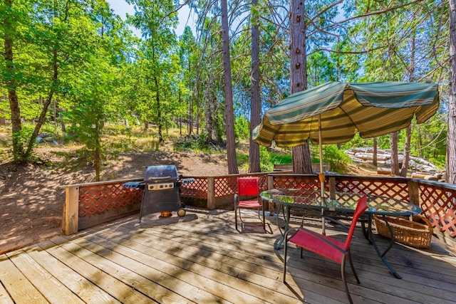 53608 Chipo Poyah, North Fork, CA 93643 - wooden terrace with outdoor dining area and a grill