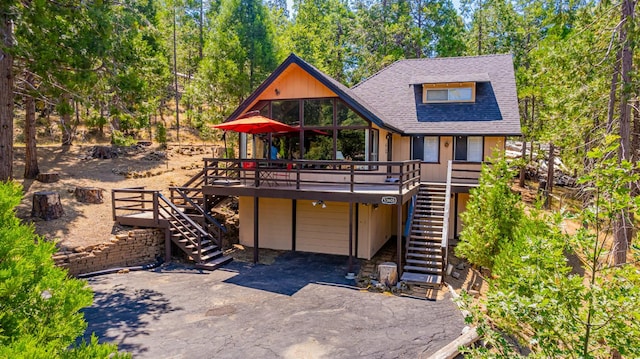 53608 Chipo Poyah, North Fork, CA 93643 - chalet / cabin featuring stairs, roof with shingles, an attached garage, and a deck