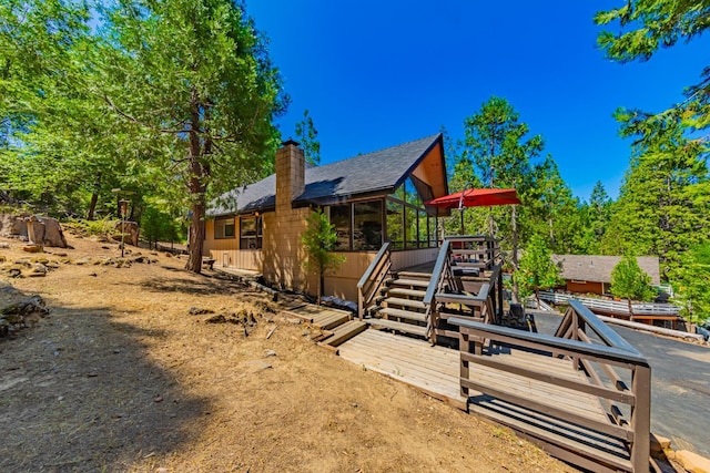 53608 Chipo Poyah, North Fork, CA 93643 - rear view of property featuring a chimney, a deck, and stairs