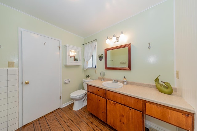 53608 Chipo Poyah, North Fork, CA 93643 - bathroom featuring wood finished floors, vanity, and crown molding