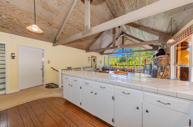 53608 Chipo Poyah, North Fork, CA 93643 - kitchen featuring white cabinetry, wood finished floors, a ceiling fan, hanging light fixtures, and carpet flooring