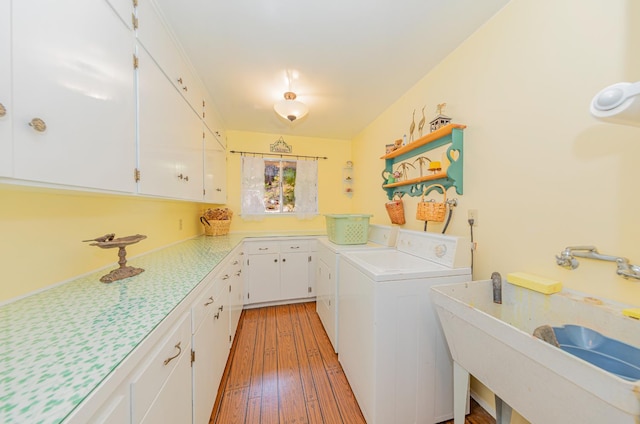 53608 Chipo Poyah, North Fork, CA 93643 - laundry area featuring cabinet space, independent washer and dryer, and light wood-type flooring