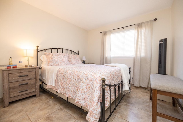 5263 W Griffith Way, Fresno, CA 93722 - bedroom with light tile patterned floors and vaulted ceiling