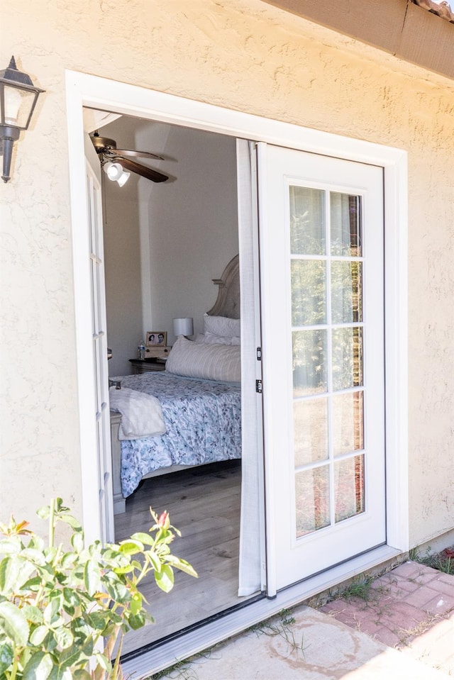 5263 W Griffith Way, Fresno, CA 93722 - doorway to property with stucco siding