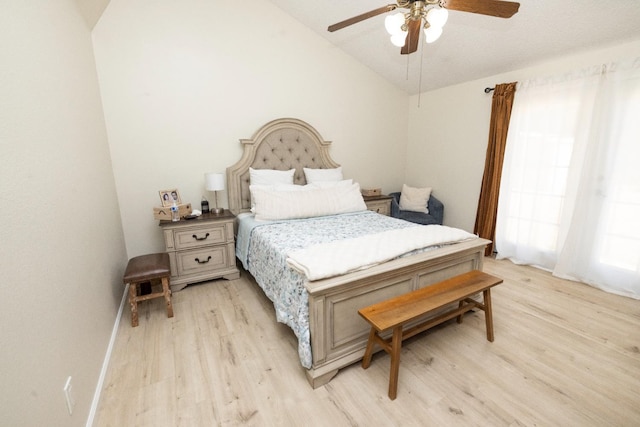 5263 W Griffith Way, Fresno, CA 93722 - bedroom with light wood-style floors, lofted ceiling, and a ceiling fan
