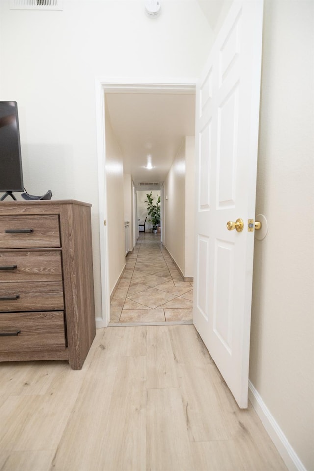5263 W Griffith Way, Fresno, CA 93722 - corridor with light wood finished floors and baseboards