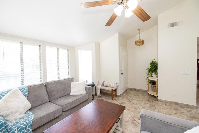 5263 W Griffith Way, Fresno, CA 93722 - living area with lofted ceiling, ceiling fan, and light tile patterned floors